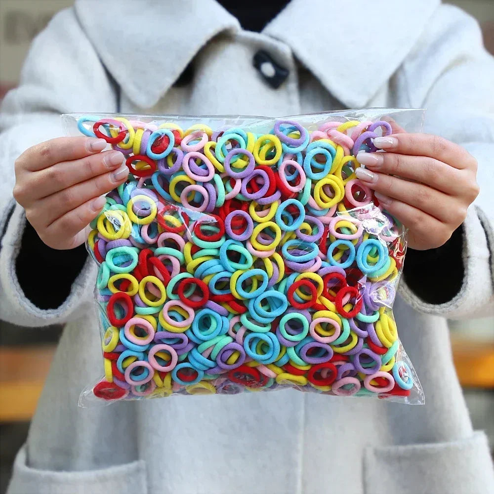 50Pcs/bag Colorful Basic Nylon Ealstic Hair Ties for Girls Ponytail Hold Scrunchie Rubber Band Kid Fashion Hair Accessories--ANDROMEDA QUINNS | AURELLE'S-ANDROMEDA QUINNS | AURELLE'S